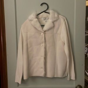 Crème sweater jacket brand is Lisa international. Size medium
